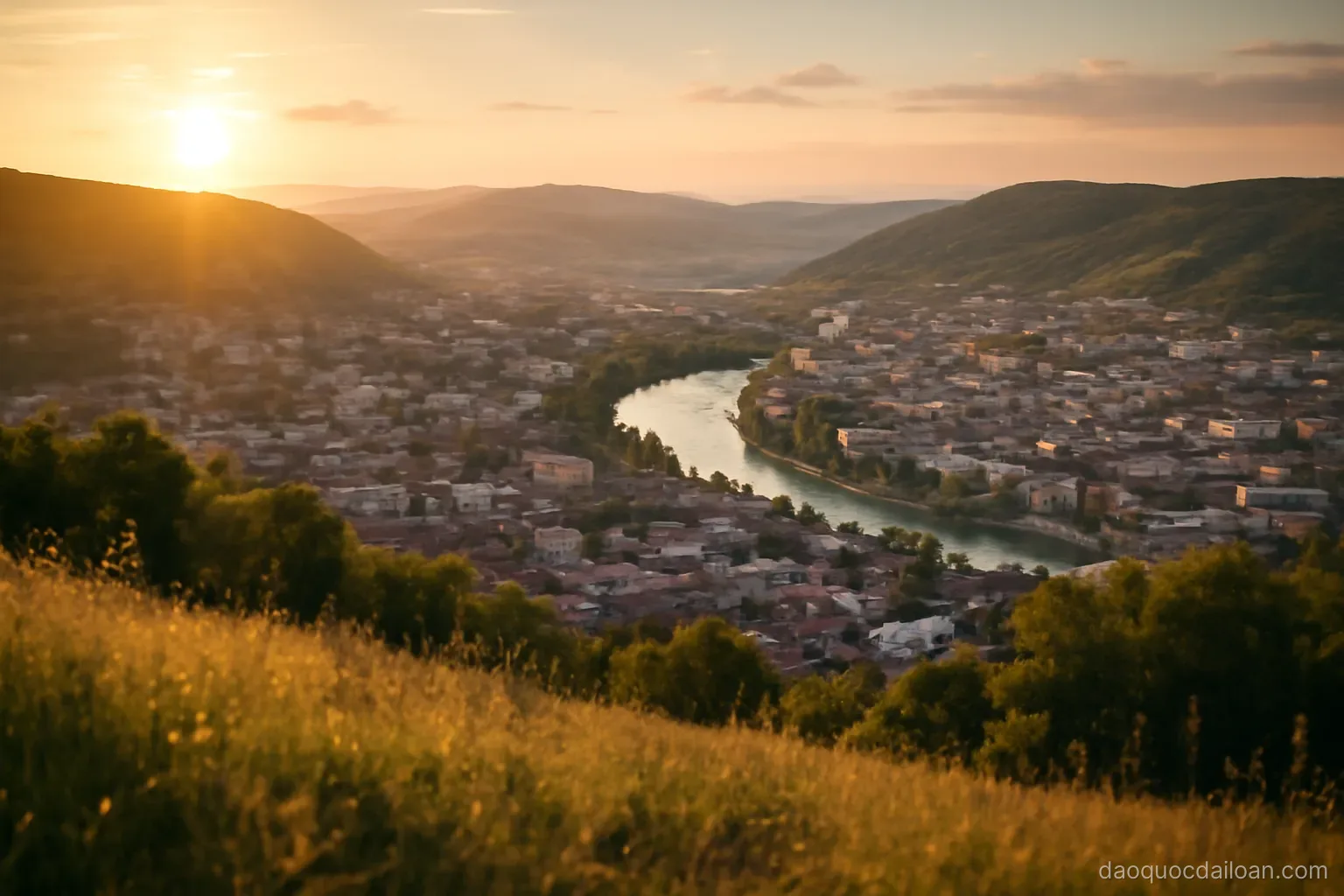 A city basin ringed by green hills with a river curving through it, seen from a hilltop at golden hour, no readable text